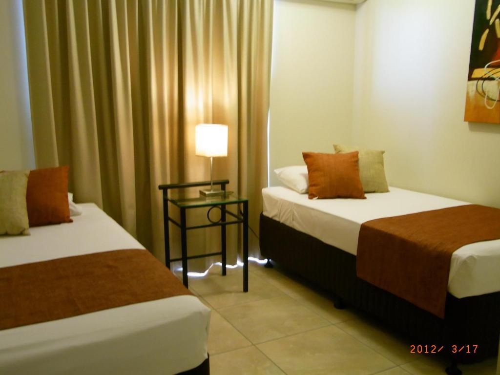 Coral Towers Holiday Suites Кернс Номер фото